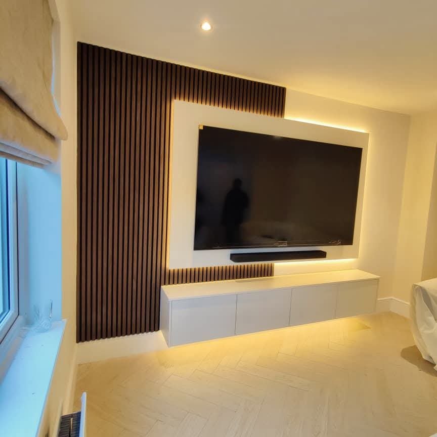 LED backlit TV frame wall with wood slat panels Manchester